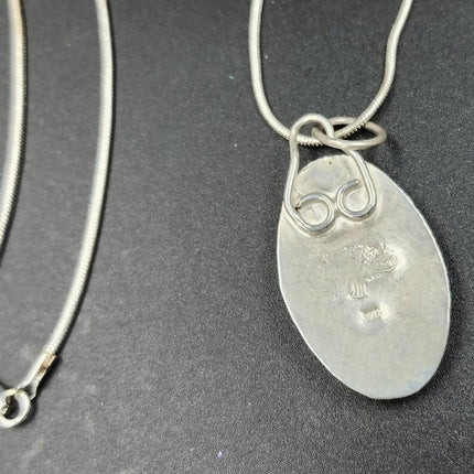 Midnight Blossom – Rhodonite Pendant (3)